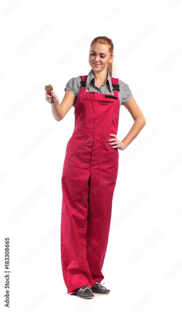 Young woman with paintbrush . Young woman with paintbrush .