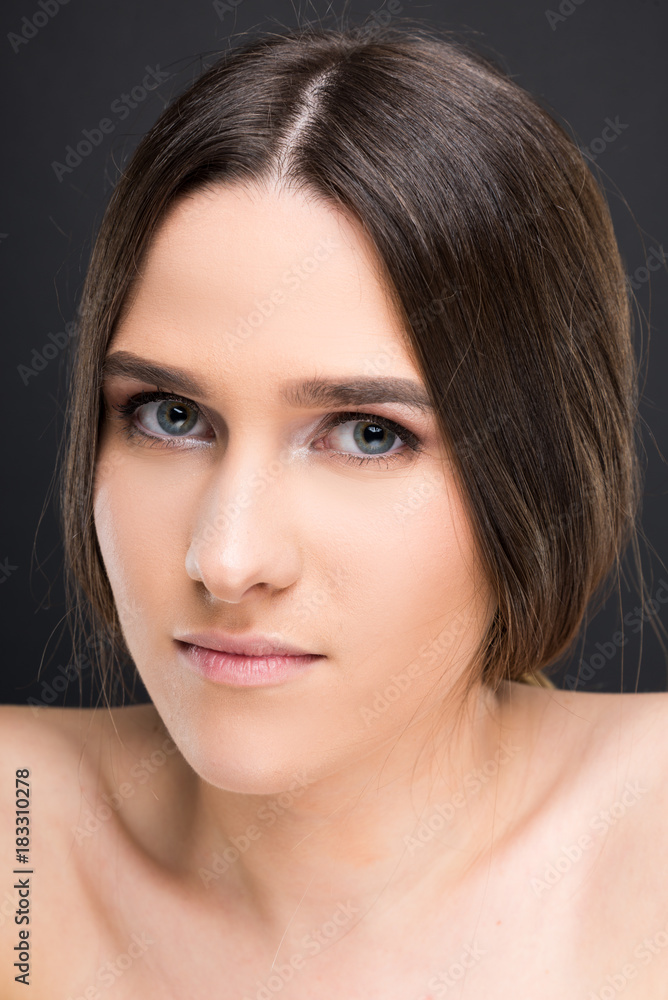Young brunette female with natural make-up Young brunette female with natural make-up