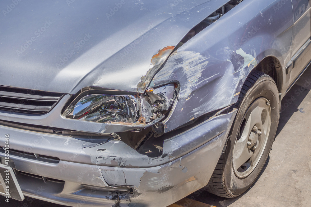 Fototapeta premium car damaged on the front cause by car crash accident on the road