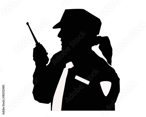 Silhouette of a woman security guard with uniform and walkie talkie.