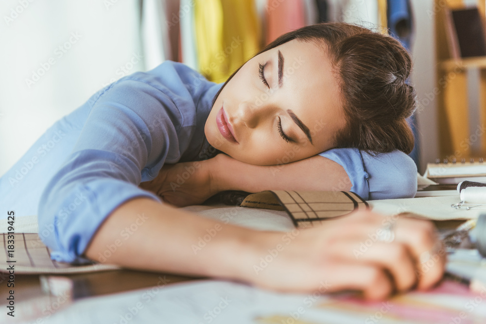 beautiful seamstress sleeping at working table beautiful seamstress sleeping at working table