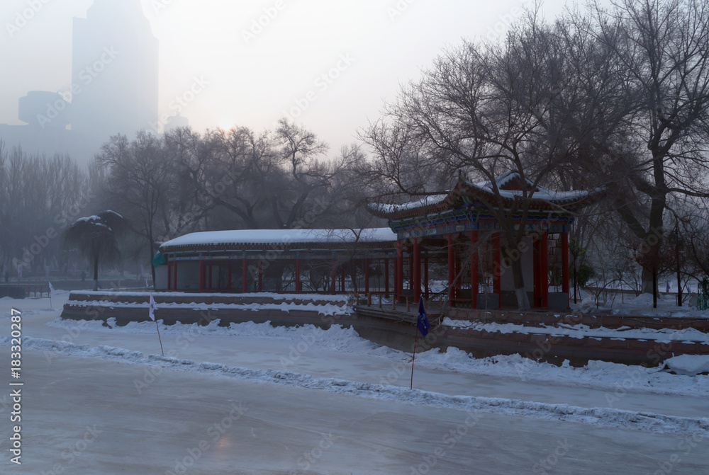 frozen lake in people's park Urumqi China