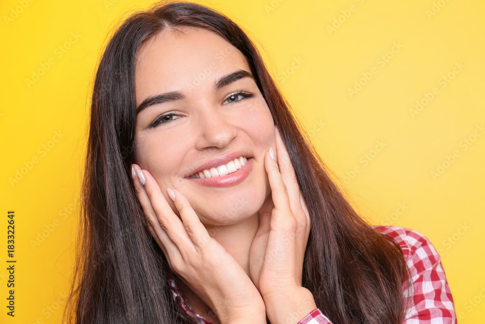 Beautiful smiling woman on color background Beautiful smiling woman on color background