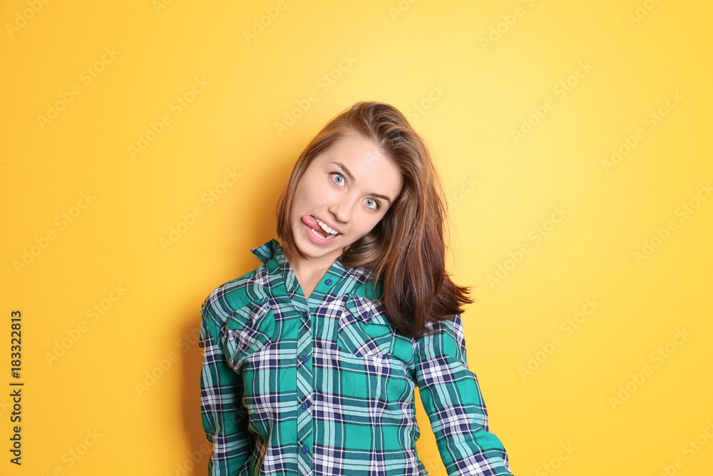 Funny young woman on color background Funny young woman on color background