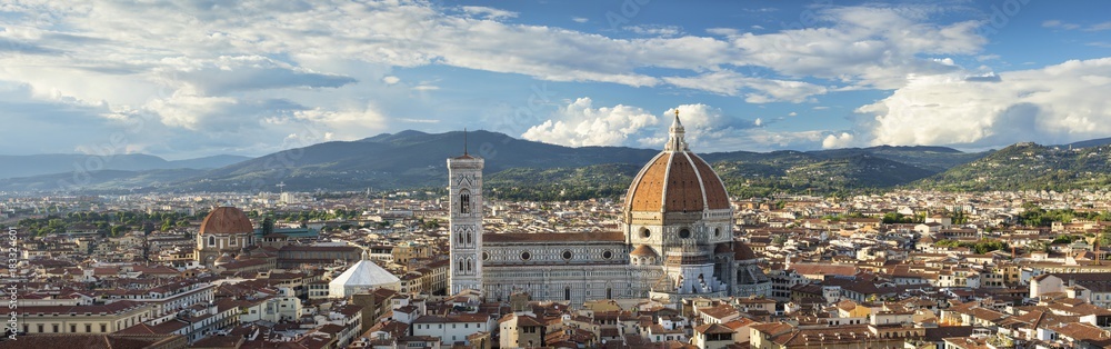 panoramic view to Florence and old church with belfry in Italy