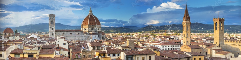Panoramic aerial view to Florence with towers and church in spring day in Italy