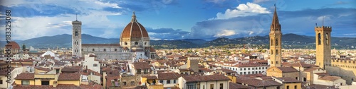 Panoramic aerial view to Florence with towers and church in spring day in Italy