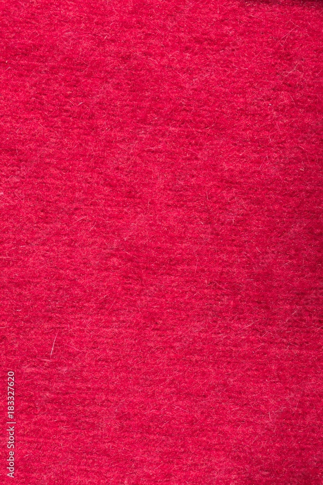 Close up of scarlet red handmade stockinette Close up of scarlet red handmade stockinette