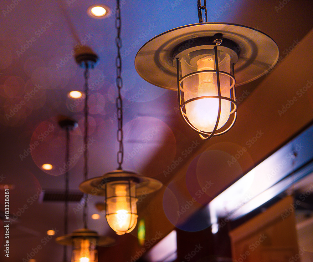 Incandescent lamps in a modern cafe. Edison lamp