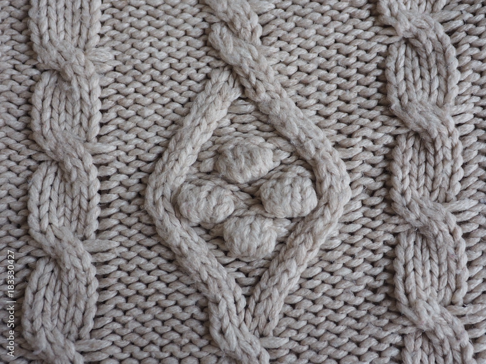 Gray knitting fabric texture background or knitted pattern background. Knitting or knitted background close up view. Gray knitting fabric texture background or knitted pattern background. Knitting or knitted background close up view.