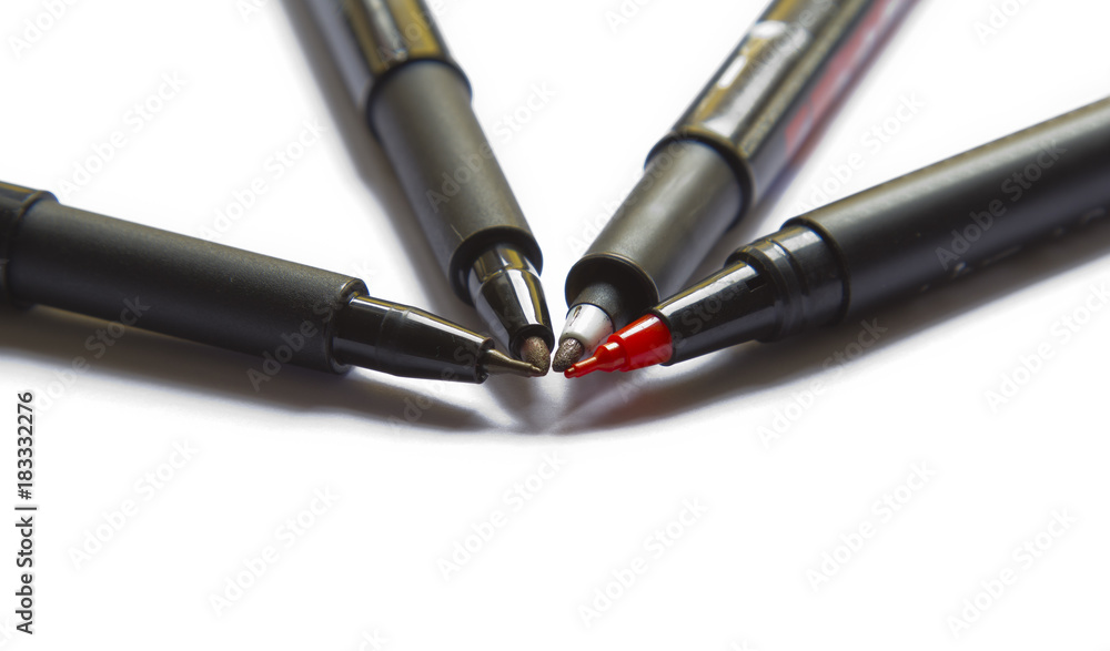 Red and Black Markers on White Background Red and Black Markers on White Background