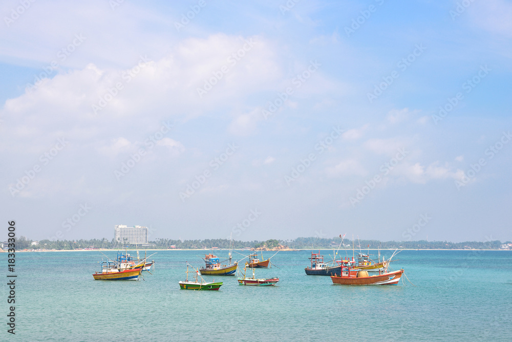 Naklejka premium Landscape. Fishing boats offshore