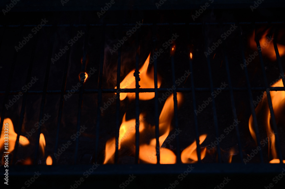 Black background with flames (red-hot grill)