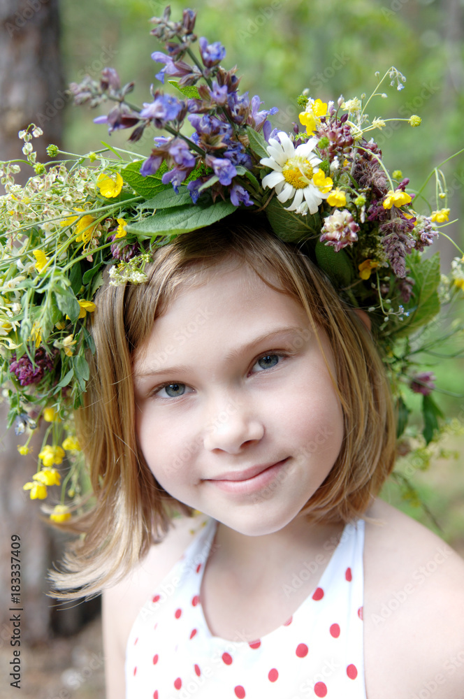 Portrait of a girl with a wreath of flowers in her hair, Sweden. Portrait of a girl with a wreath of flowers in her hair, Sweden.