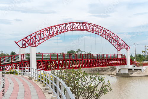 Red Suspension bridge of Laharn rai temple, Rayong Province, Thailand Tourist Attraction
