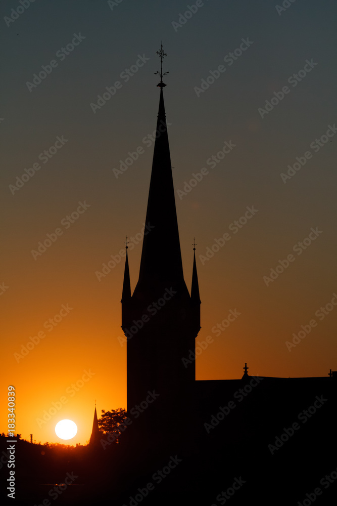 Sunset With A Church Silhouette