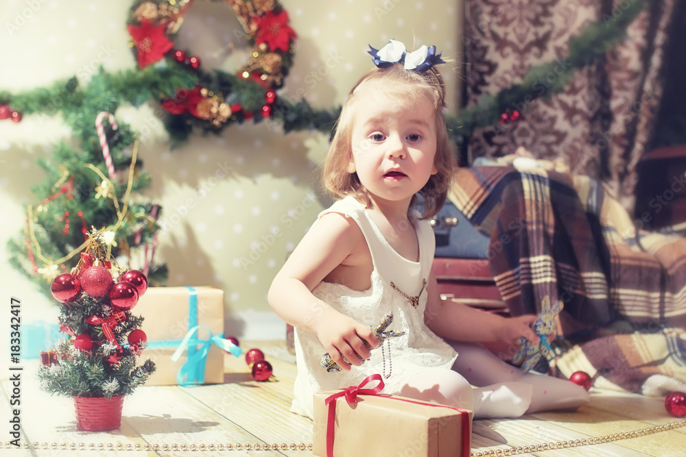 little girl and Christmas tree little girl and Christmas tree