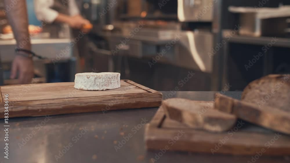 Man with a knife in the kitchen