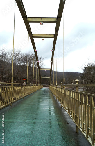  suspension bridge over the Psekups River to the central park of Goryachiy Klyuch photo