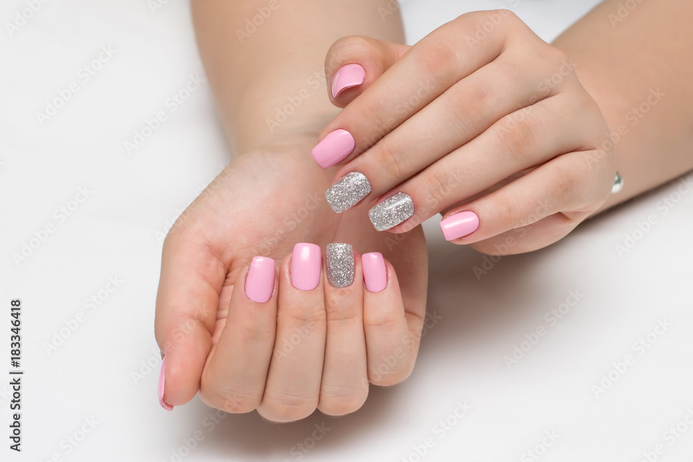 pink manicure with silver sequins on square nails
