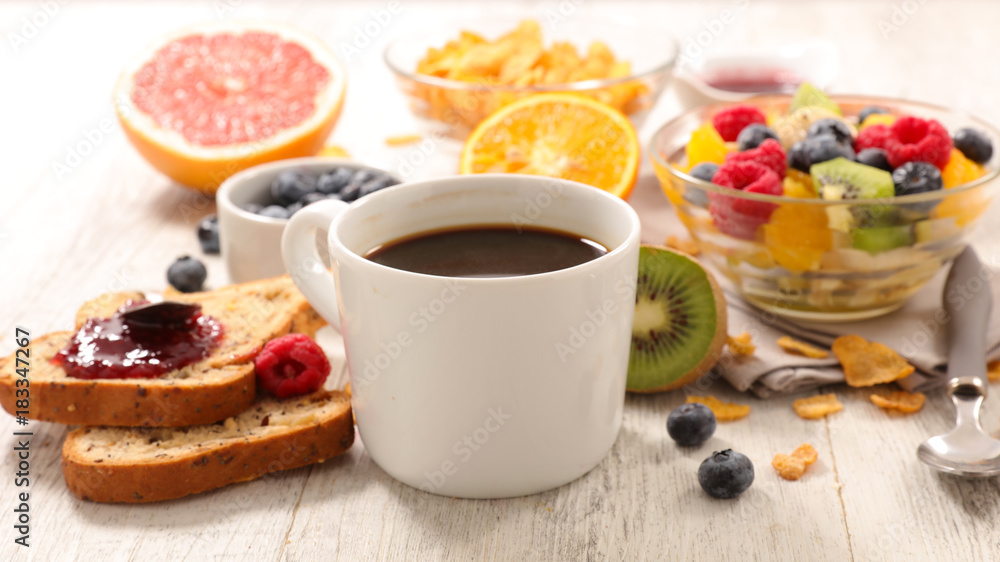 coffee cup with fruit, cornflakes and bread toast coffee cup with fruit, cornflakes and bread toast