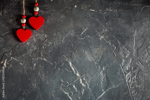 Hearts on Valentine's Day on fir and concrete background with space and empty place