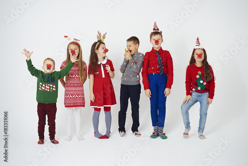 Playful children with clown's nose photo