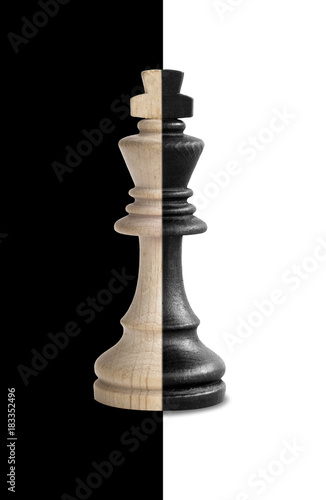 Fotografie, Obraz Chess king showing its duality in black and white background