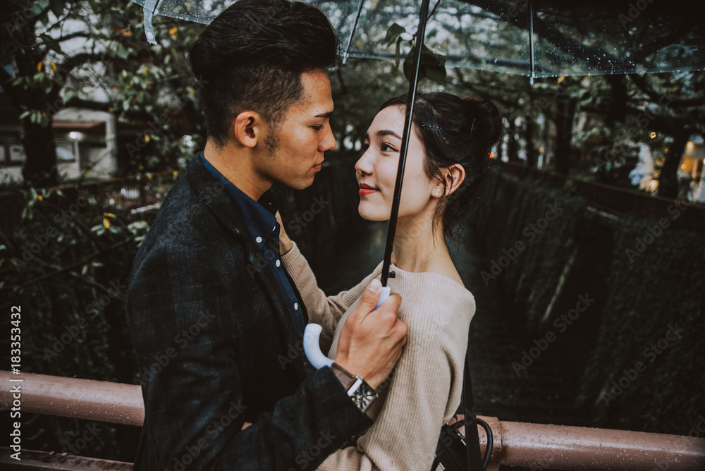 Obraz premium Young japanese couple spending time together in Tokyo