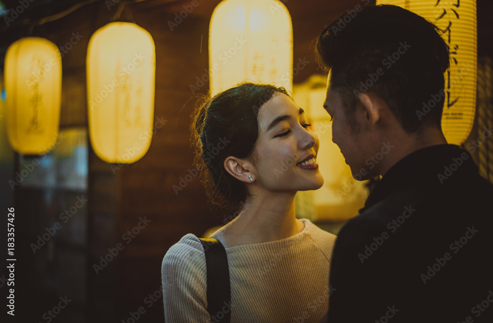 Obraz premium Young japanese couple spending time together in Tokyo