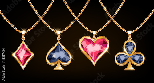 Playing cards suits golden pendants set.