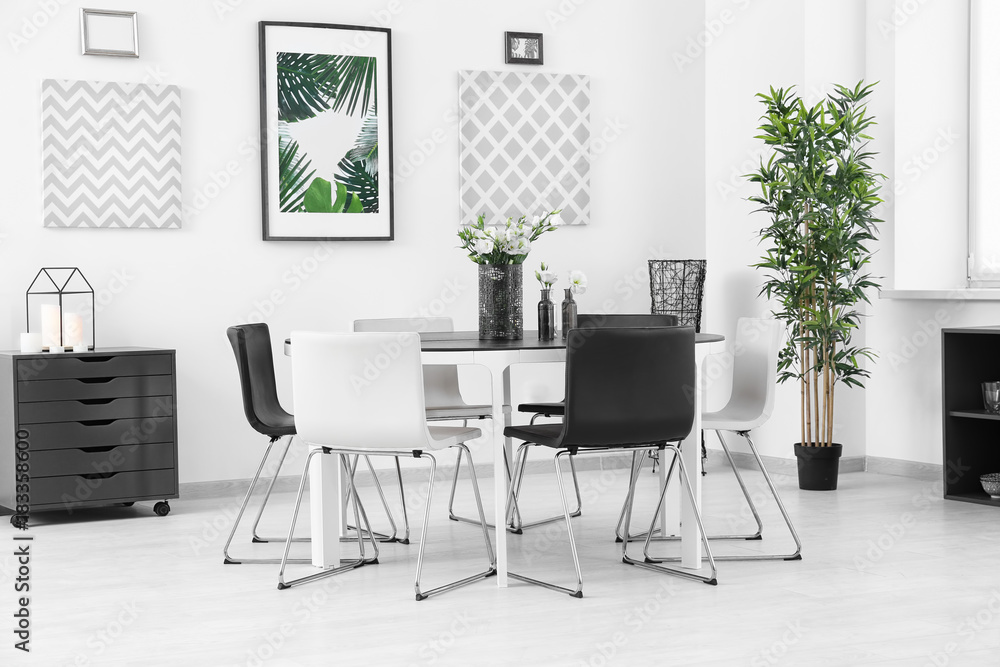 Modern room interior with big table and chairs