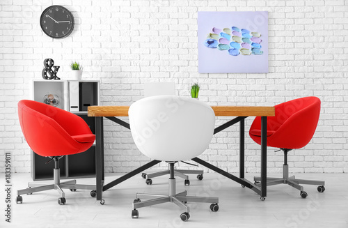 Table and armchairs in mode...