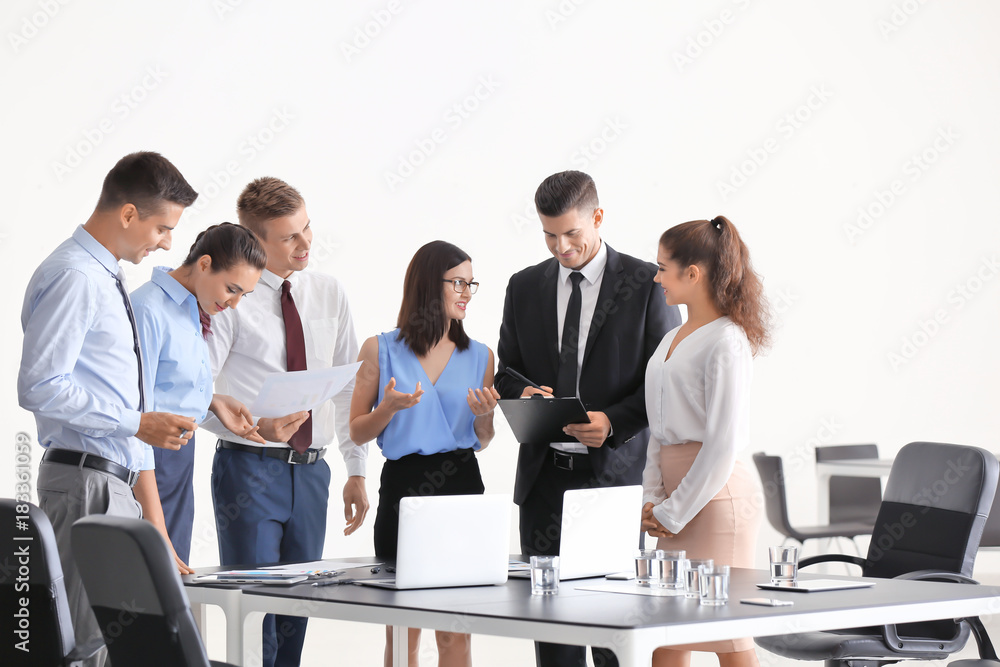 Team of young consulting experts on business meeting in office Team of young consulting experts on business meeting in office
