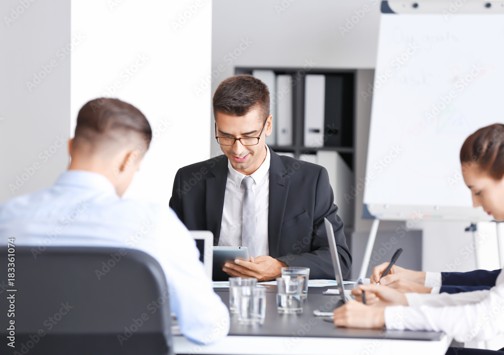 Team of young consulting experts on business meeting in office Team of young consulting experts on business meeting in office