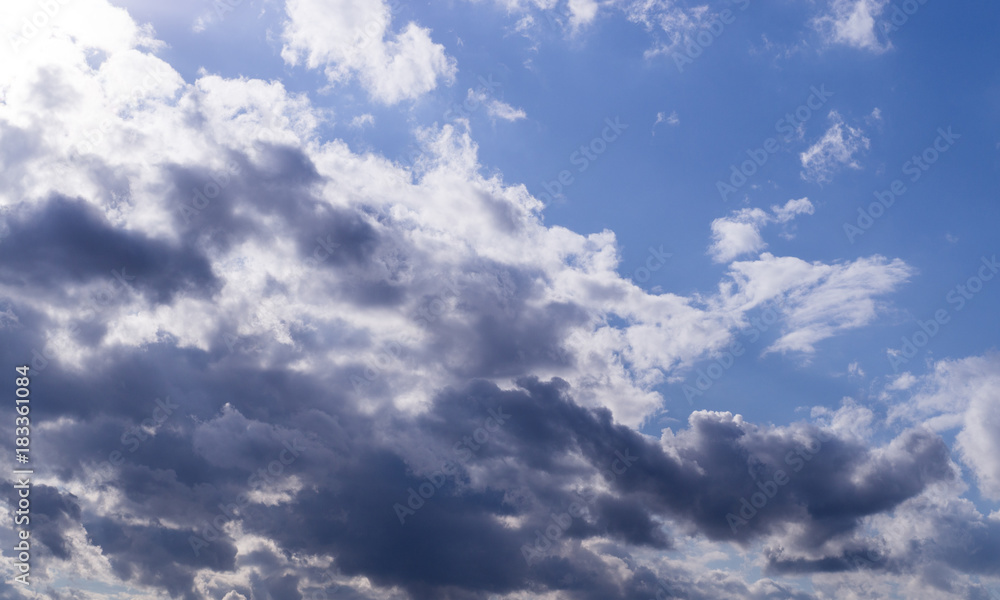 bright blue sky with clouds and sun. cirrocumulus, background, weather.