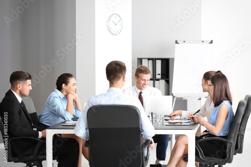 Team of young consulting experts on business meeting in office