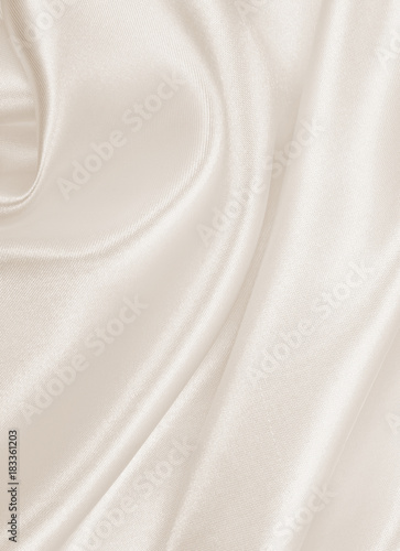 Smooth elegant golden silk or satin luxury cloth texture as wedding background. Luxurious background design. In Sepia toned. Retro style