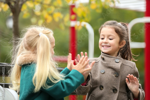 Cute little girls in outwea...