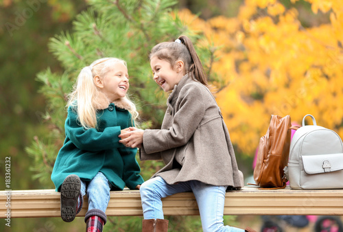 Cute little girls in outwea...