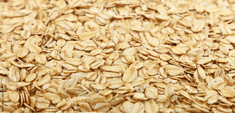 Porridge oat grits close up background Porridge oat grits close up background