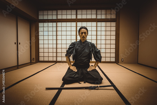 Samurai training in a traditional dojo, in Tokyo