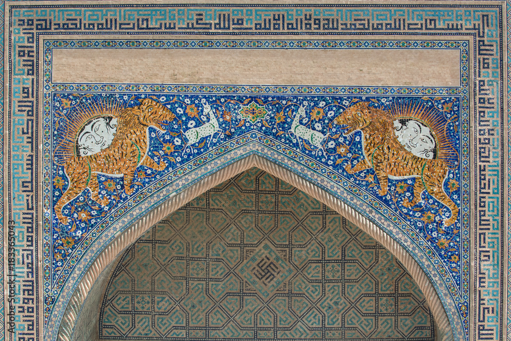 Arch with traditional ancient Asian mosaic. the details of the architecture of medieval Central Asia