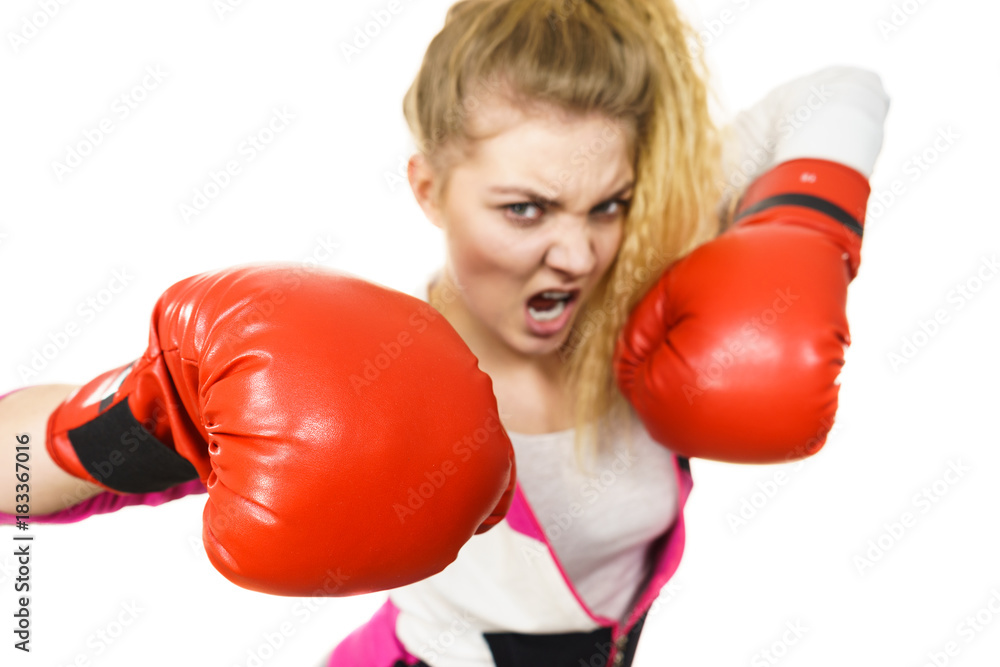 Angry woman wearing boxing gloves Angry woman wearing boxing gloves