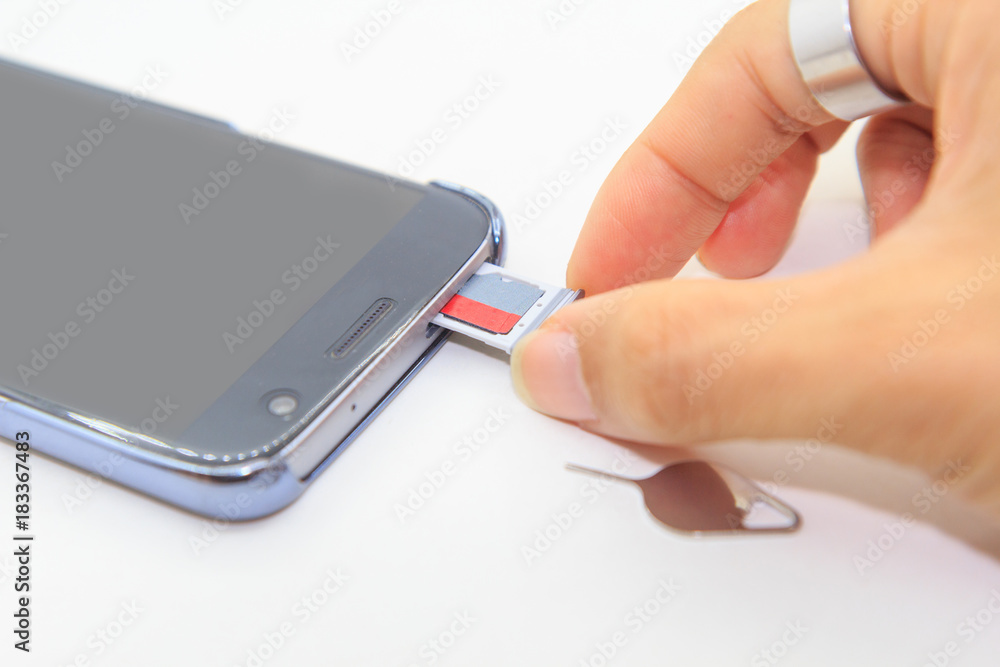 Fototapeta premium Remove memory card of smartphone 
