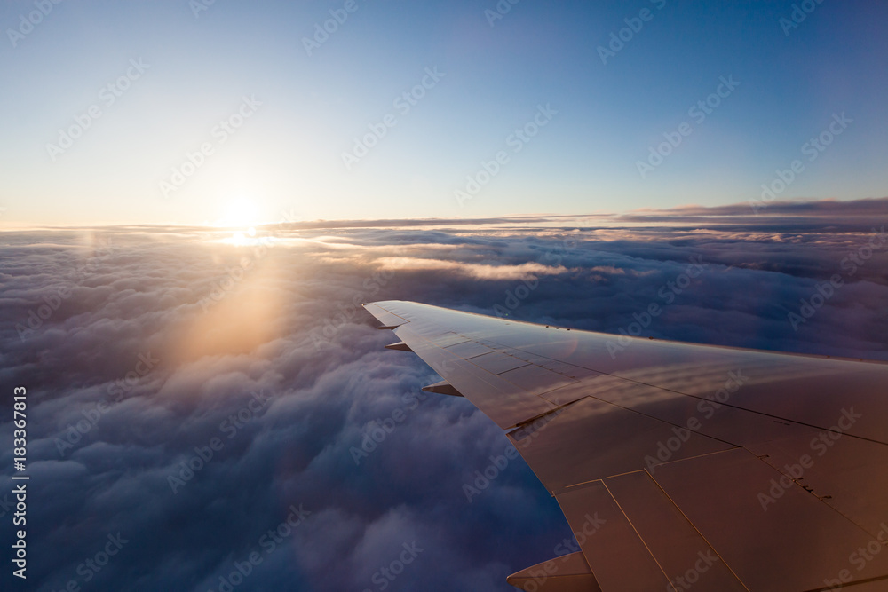 Watching the sunrise from an airplane Watching the sunrise from an airplane