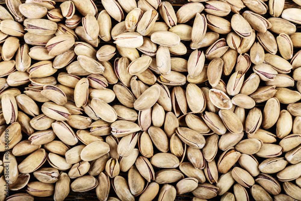 tasty pistachios lying on the table, space for text tasty pistachios lying on the table, space for text