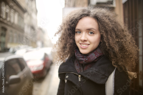 Smiling girl in the street