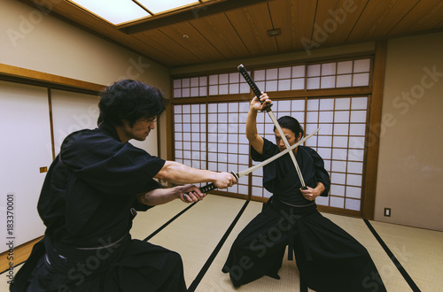 Samurai training in a traditional dojo, in Tokyo