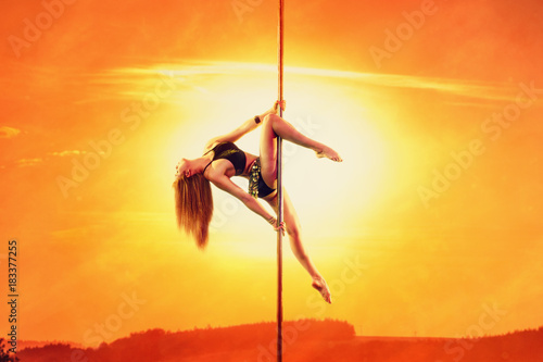 Pole dancing woman